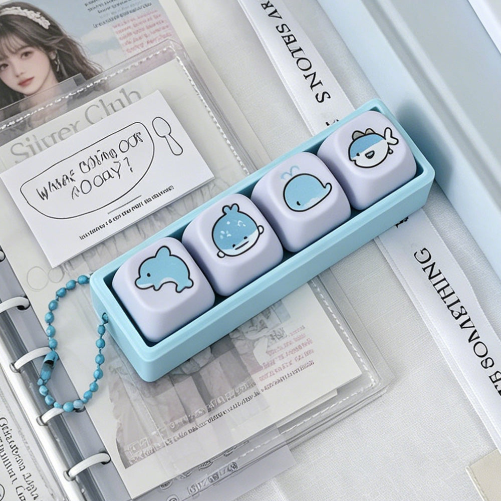 This Whale & Dolphin Fidget Keychain Is My New Obsession