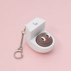 Quirky Toilet Poop Pop-Up Clicker Keychain - Fun Gag Gift & Desk Decor Toy