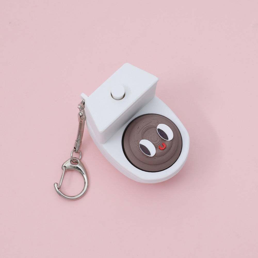 Quirky Toilet Poop Pop-Up Clicker Keychain - Fun Gag Gift & Desk Decor Toy