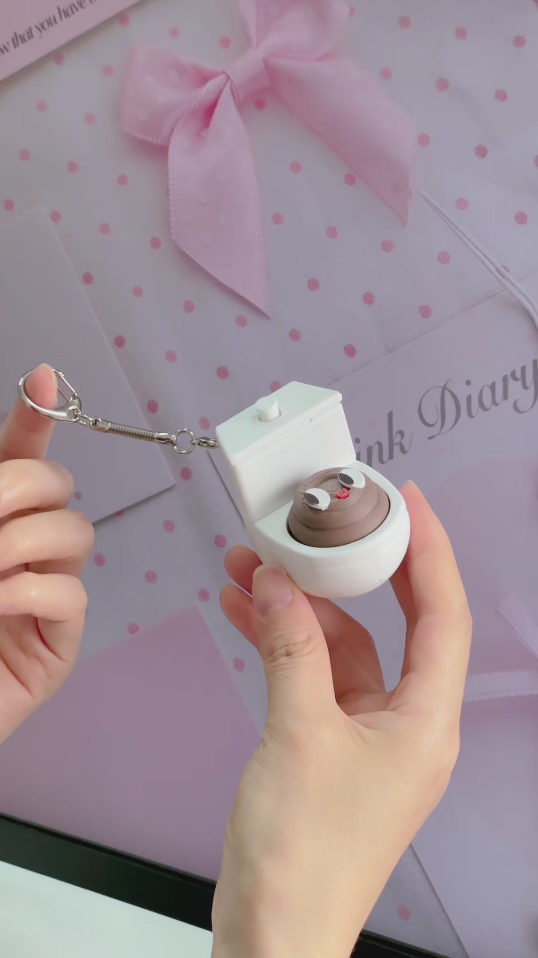 Quirky Toilet Poop Pop-Up Clicker Keychain - Fun Gag Gift & Desk Decor Toy